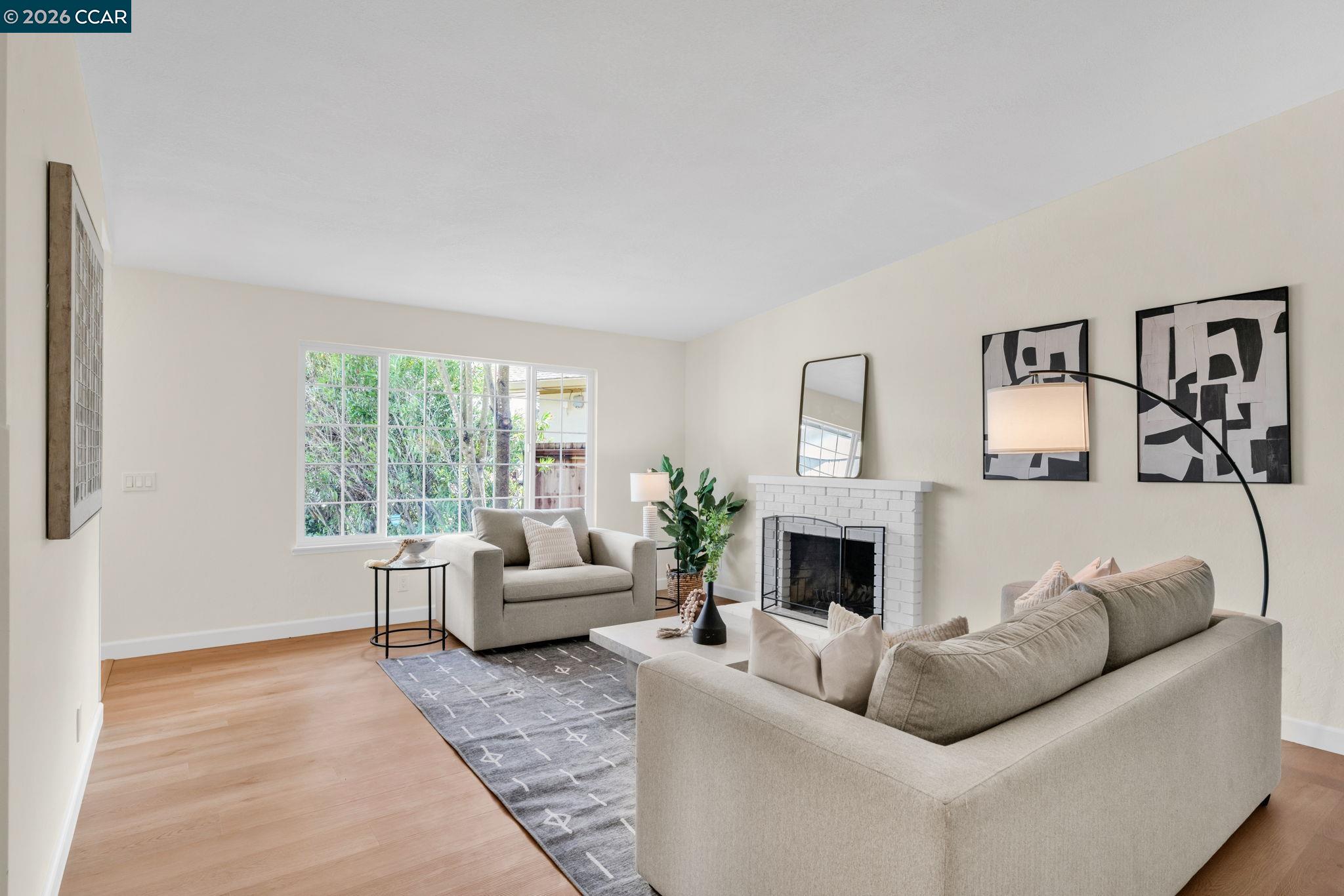 32 Yale Court San Ramon, CA 94583 - Photo 10 of 40 a living room with furniture fireplace and window