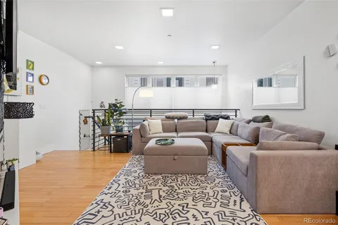 a living room with furniture and a couch