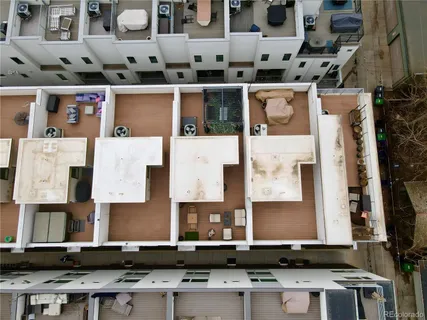 a view of a lake with houses in the back