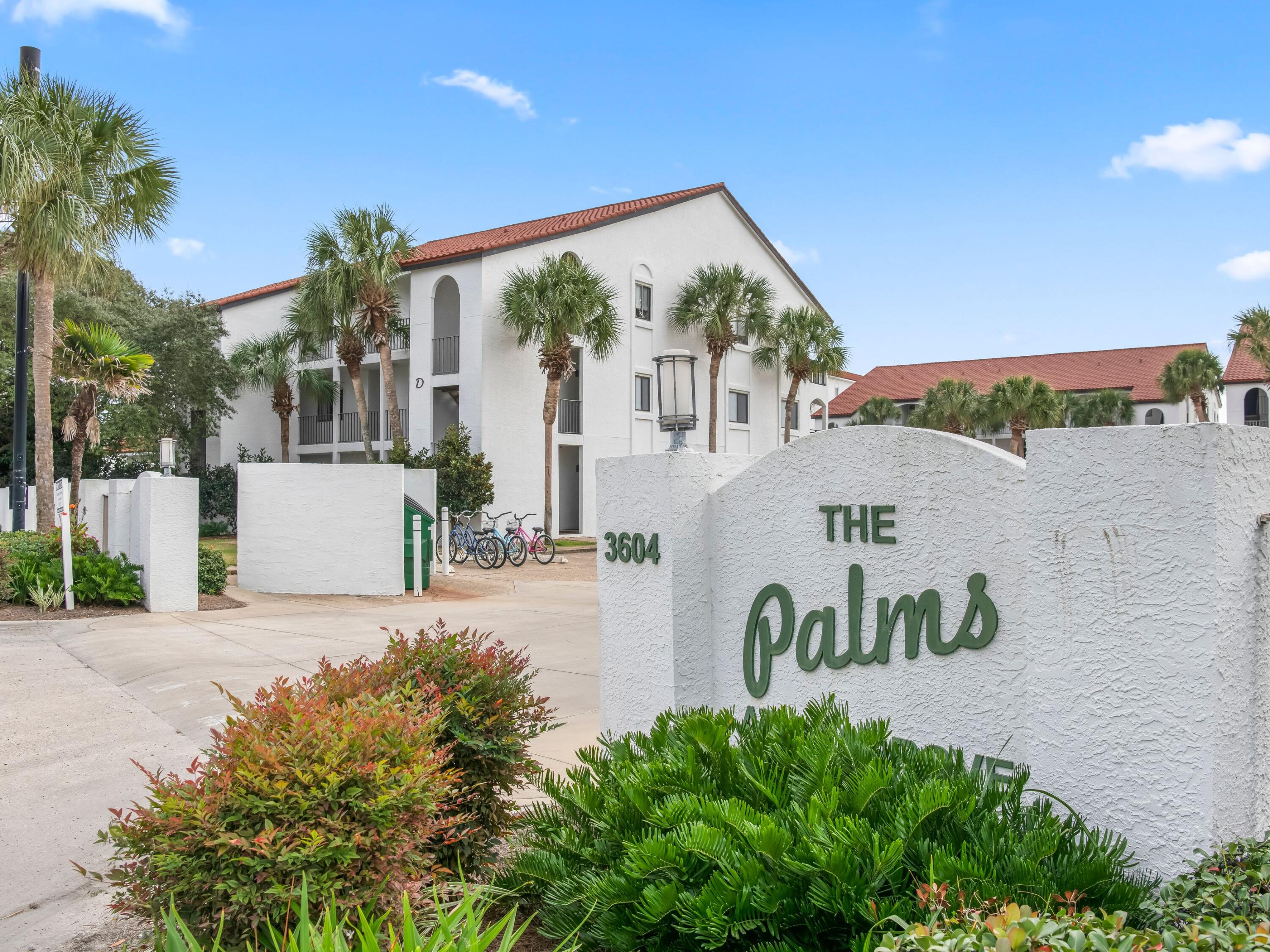 3604 East County Highway 30A, Unit D5 Santa Rosa Beach, FL 32459 - Photo 1 of 45 a front view of a house with garden