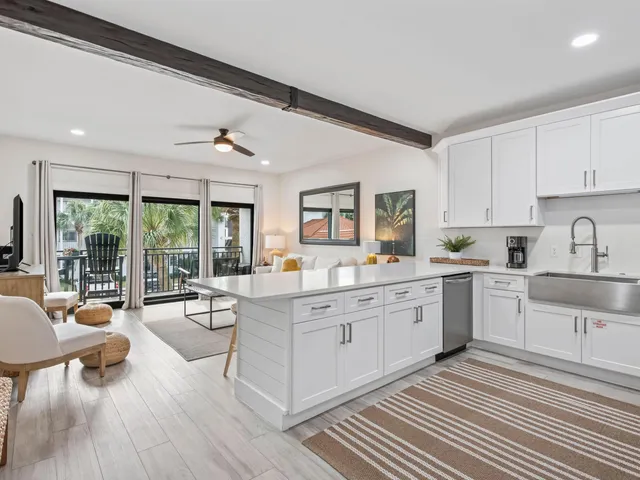 a en suite bathroom with a double vanity sink a mirror and a shower