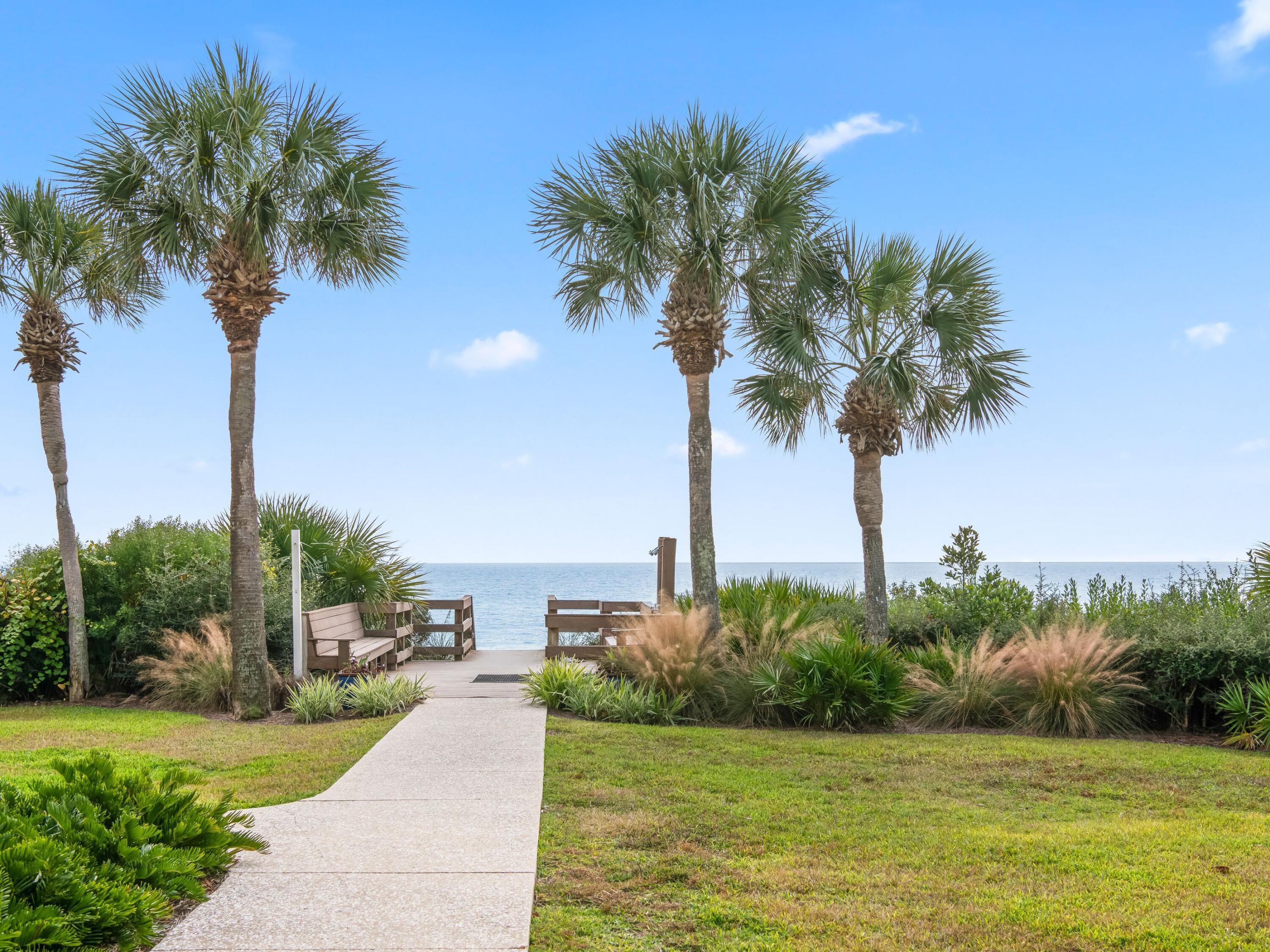 3604 East County Highway 30A, Unit D5 Santa Rosa Beach, FL 32459 - Photo 36 of 45 a view of a ocean with a palm trees