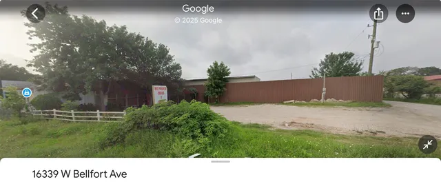 a black and white photo of a house