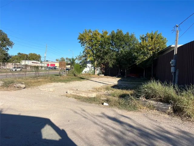 a view of a backyard of a house