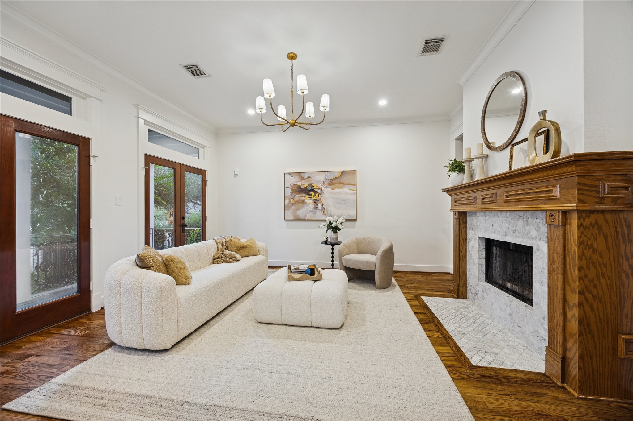401 West 21st Street Houston, TX 77008 - Photo 9 of 50 Just on the other side of the dual fireplace is the formal living room.