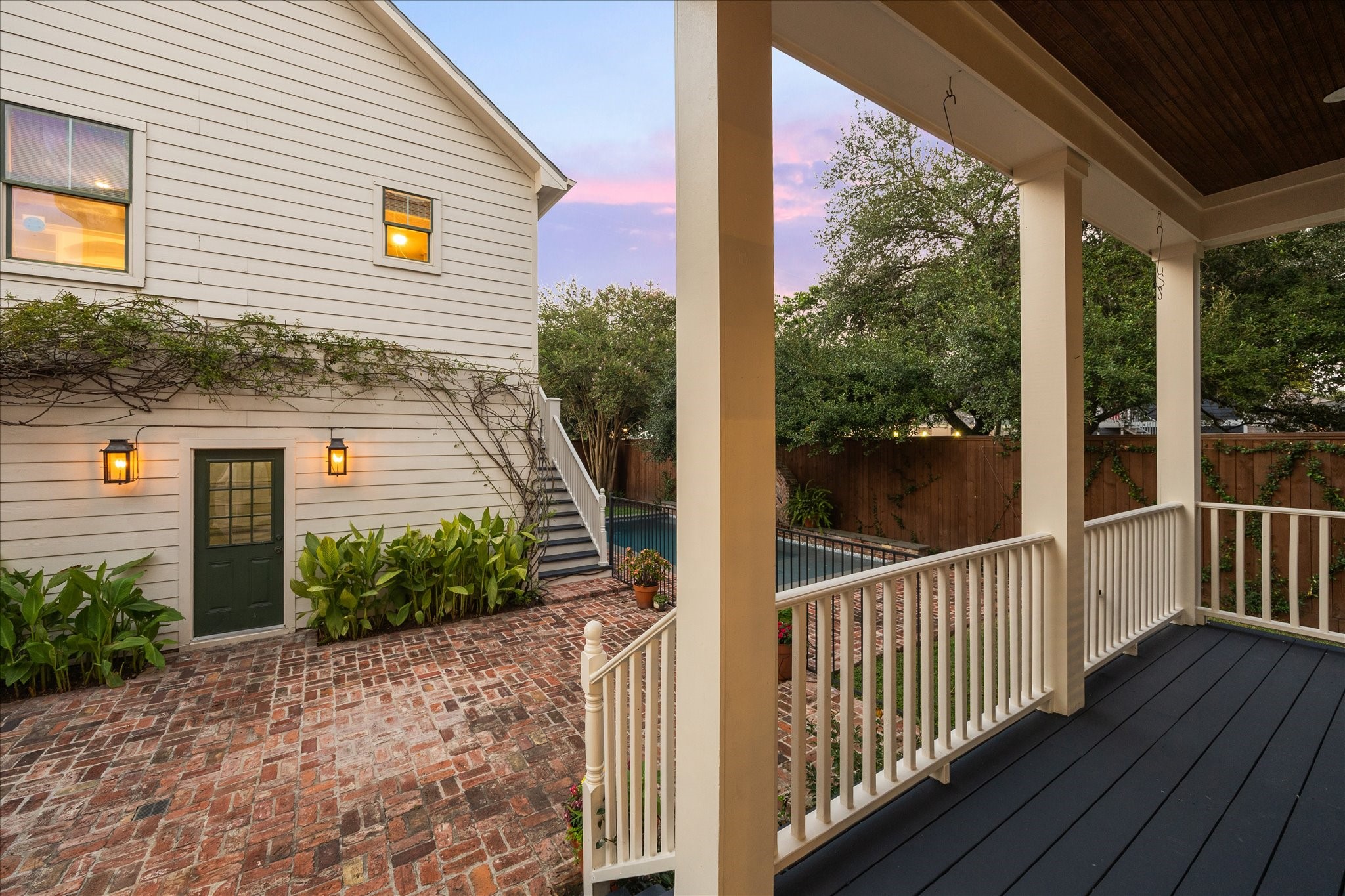 401 West 21st Street Houston, TX 77008 - Photo 31 of 50 There are so many features to love from the gas lamps surrounding the home, to the landscaping with the peggy martin vine lining the garage.