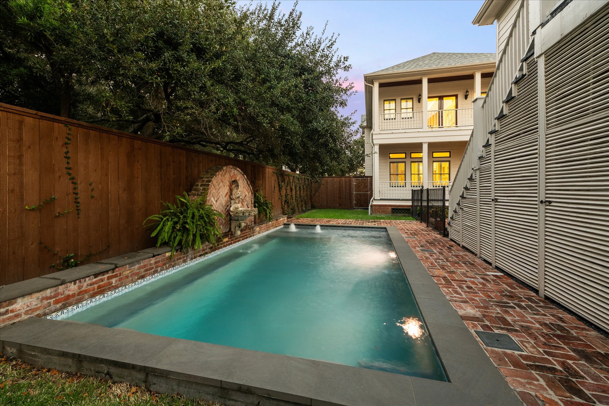 401 West 21st Street Houston, TX 77008 - Photo 5 of 50 The pool features Wi-fi connections to a waterfall, in-pool fountains, and heating and cooling. Set the pool to your liking before you even get home.