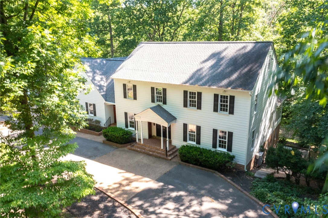 3201 East Brigstock Road Midlothian, VA 23113 - Photo 70 of 72 a view of a front of house with a yard