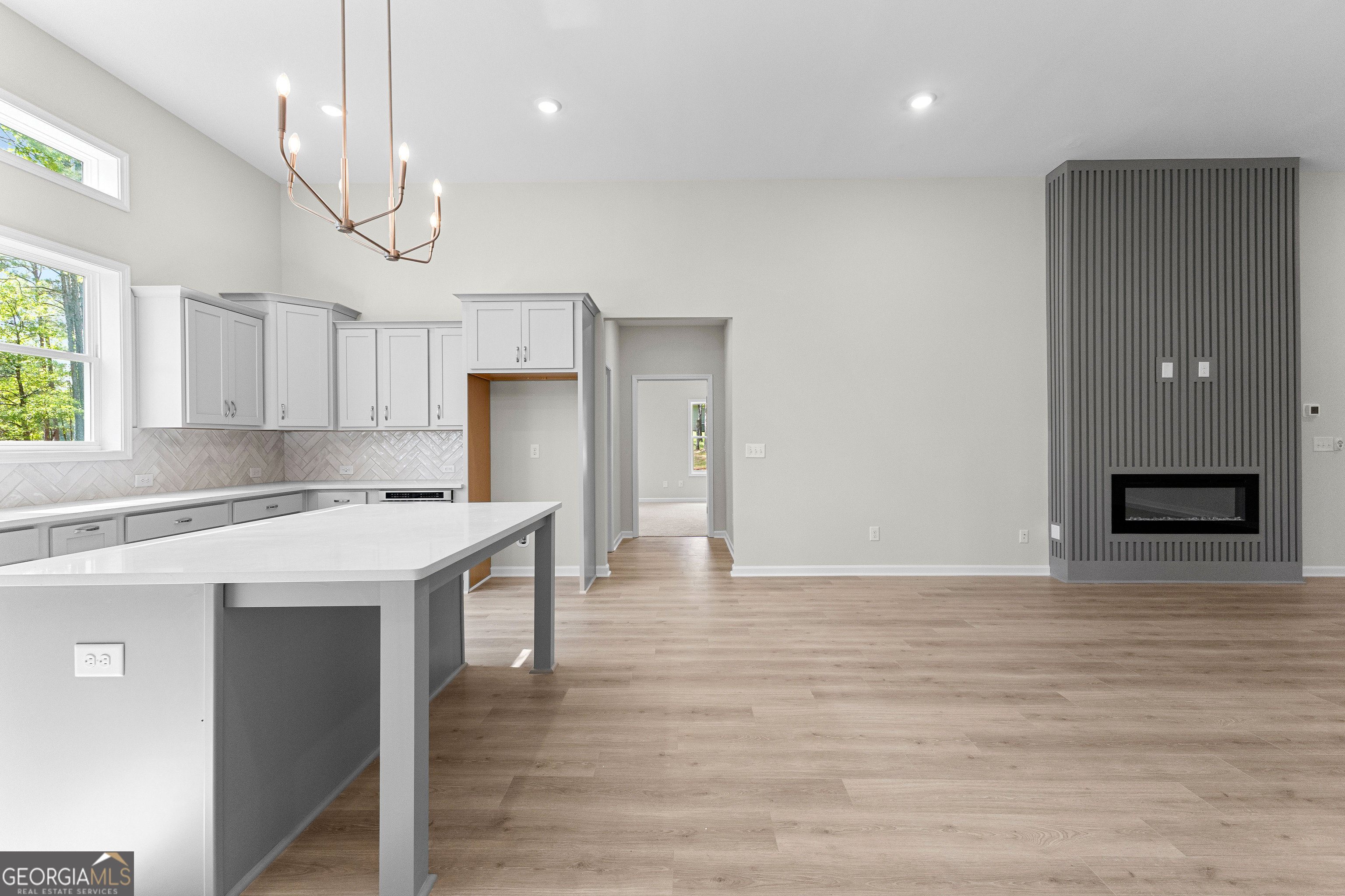 1242 Waymanville Road Thomaston, GA 30286 - Photo 21 of 52 a view of kitchen with cabinets and wooden floor