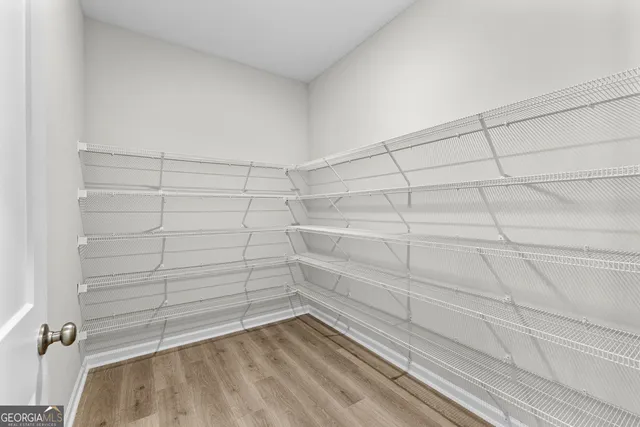 a view of a room with racks on the wall