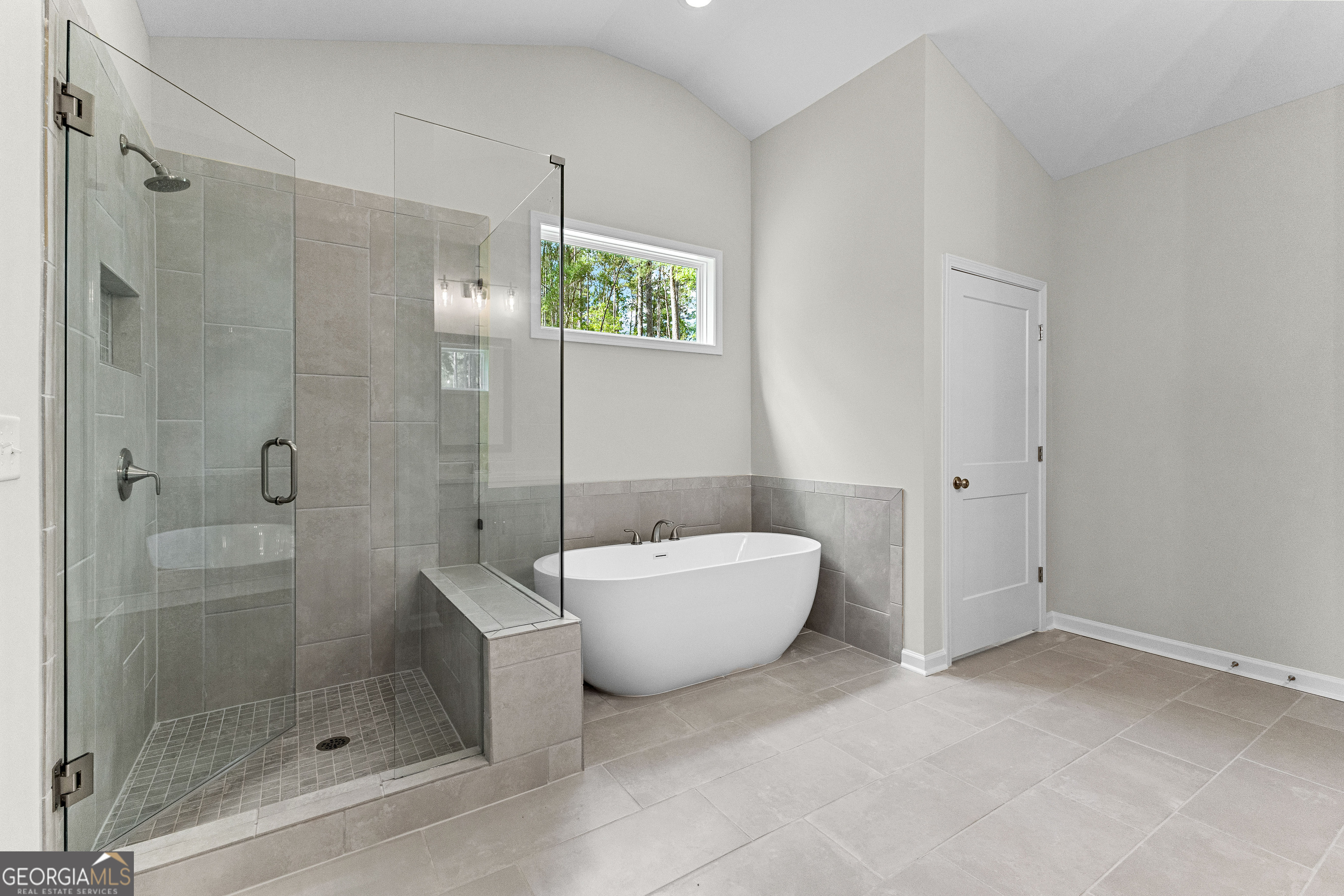 1242 Waymanville Road Thomaston, GA 30286 - Photo 27 of 52 a bathroom with a bathtub and a shower