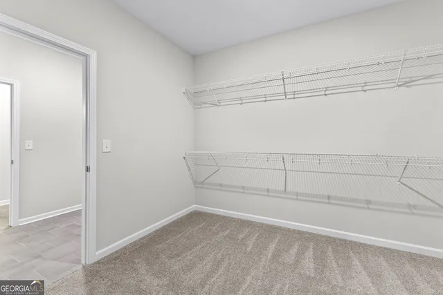 a view of a room with racks on the wall