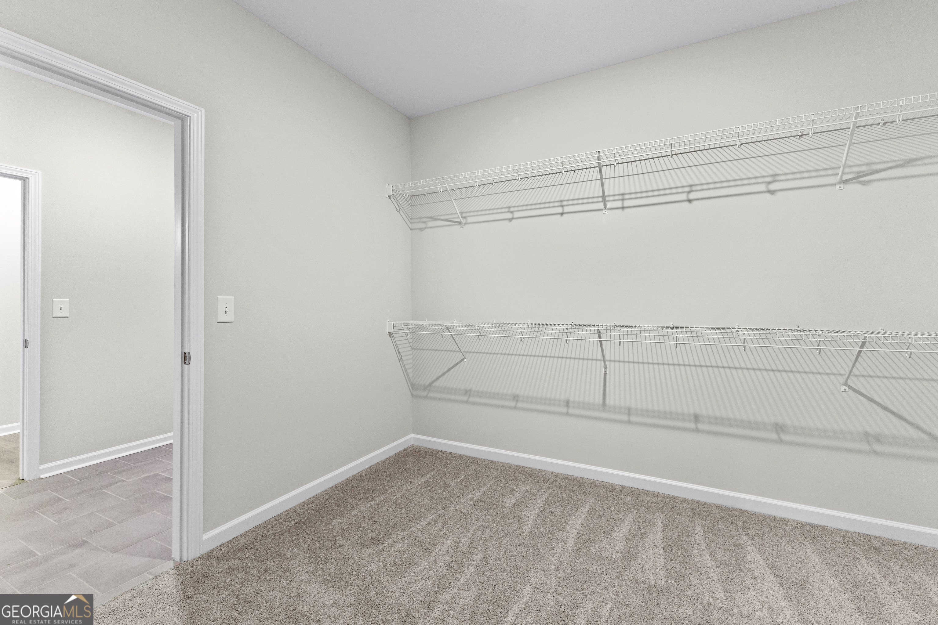 1242 Waymanville Road Thomaston, GA 30286 - Photo 31 of 52 a view of a room with racks on the wall