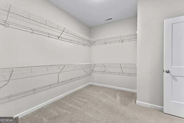 a view of a room with racks on the wall