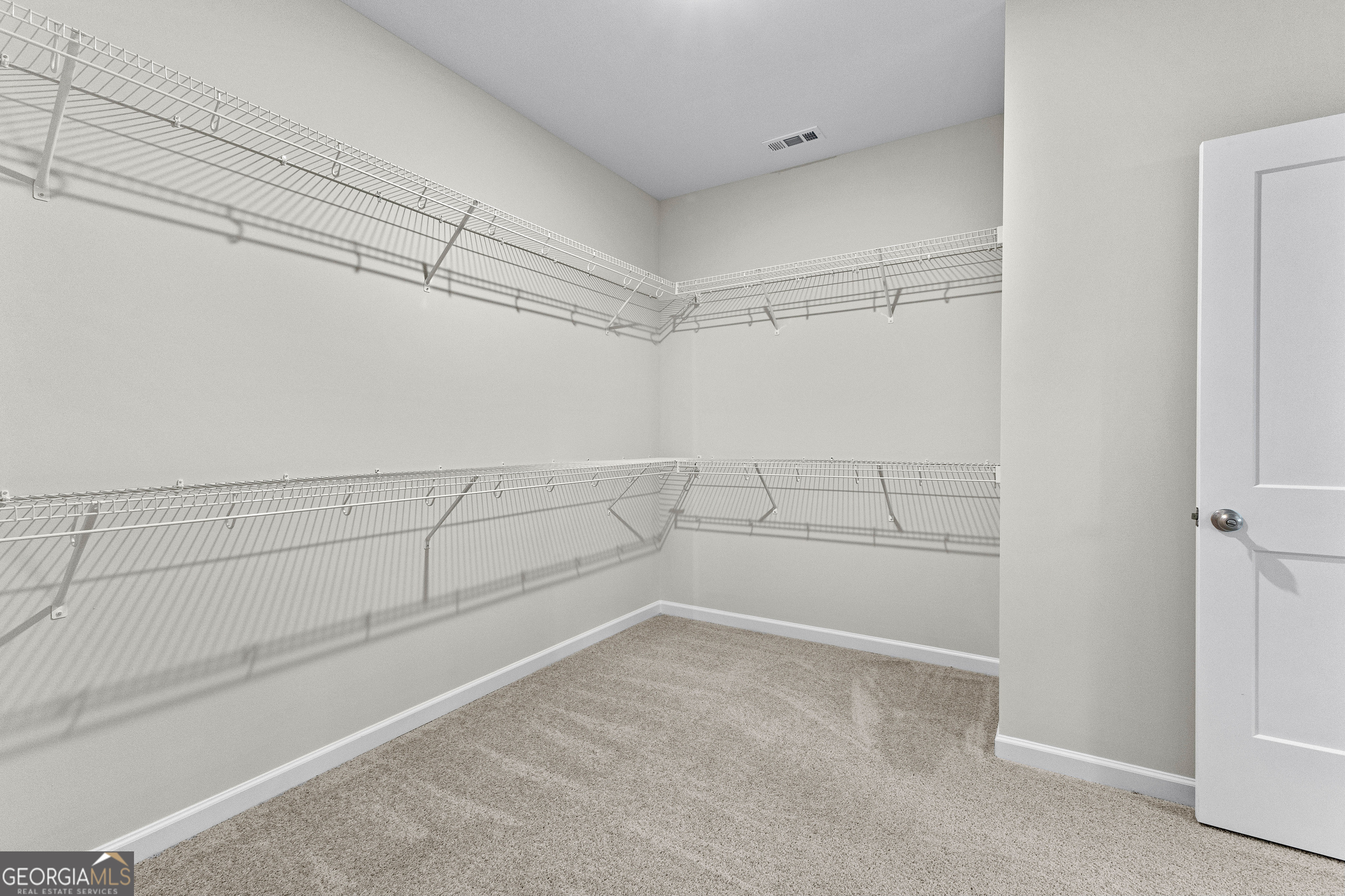 1242 Waymanville Road Thomaston, GA 30286 - Photo 32 of 52 a view of a room with racks on the wall