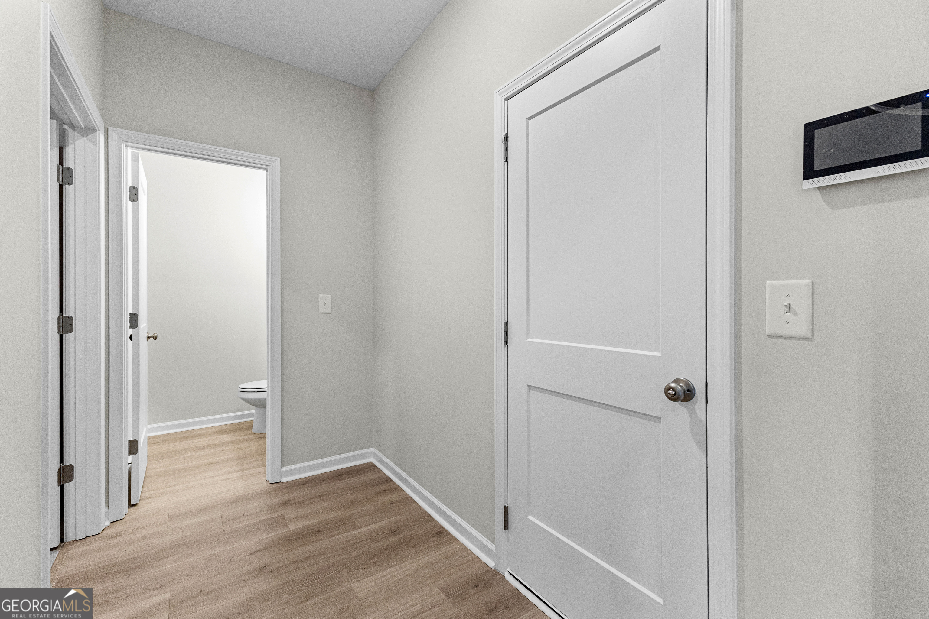 1242 Waymanville Road Thomaston, GA 30286 - Photo 34 of 52 a view of a hallway with wooden floor