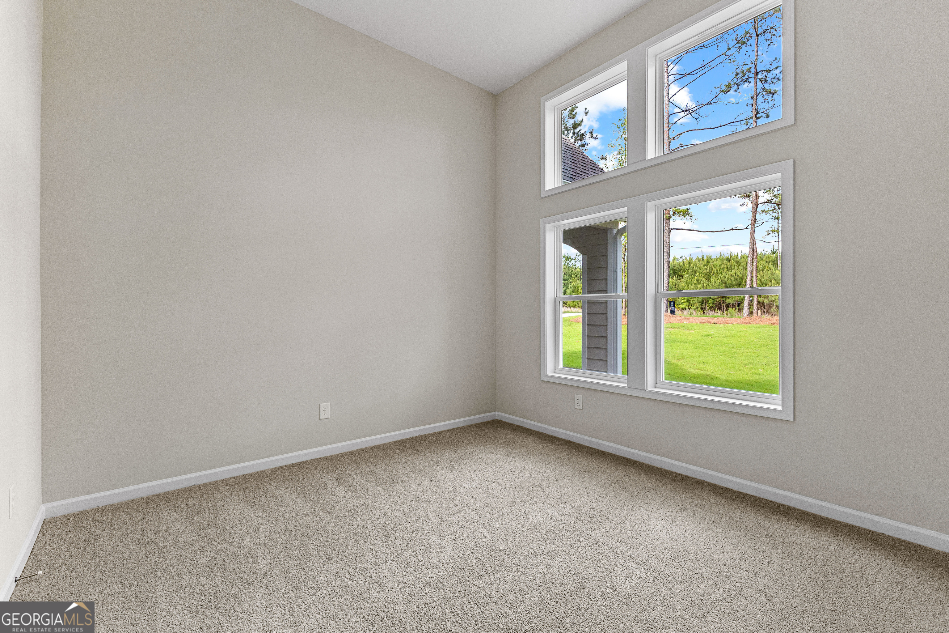 1242 Waymanville Road Thomaston, GA 30286 - Photo 40 of 52 an empty room with a window