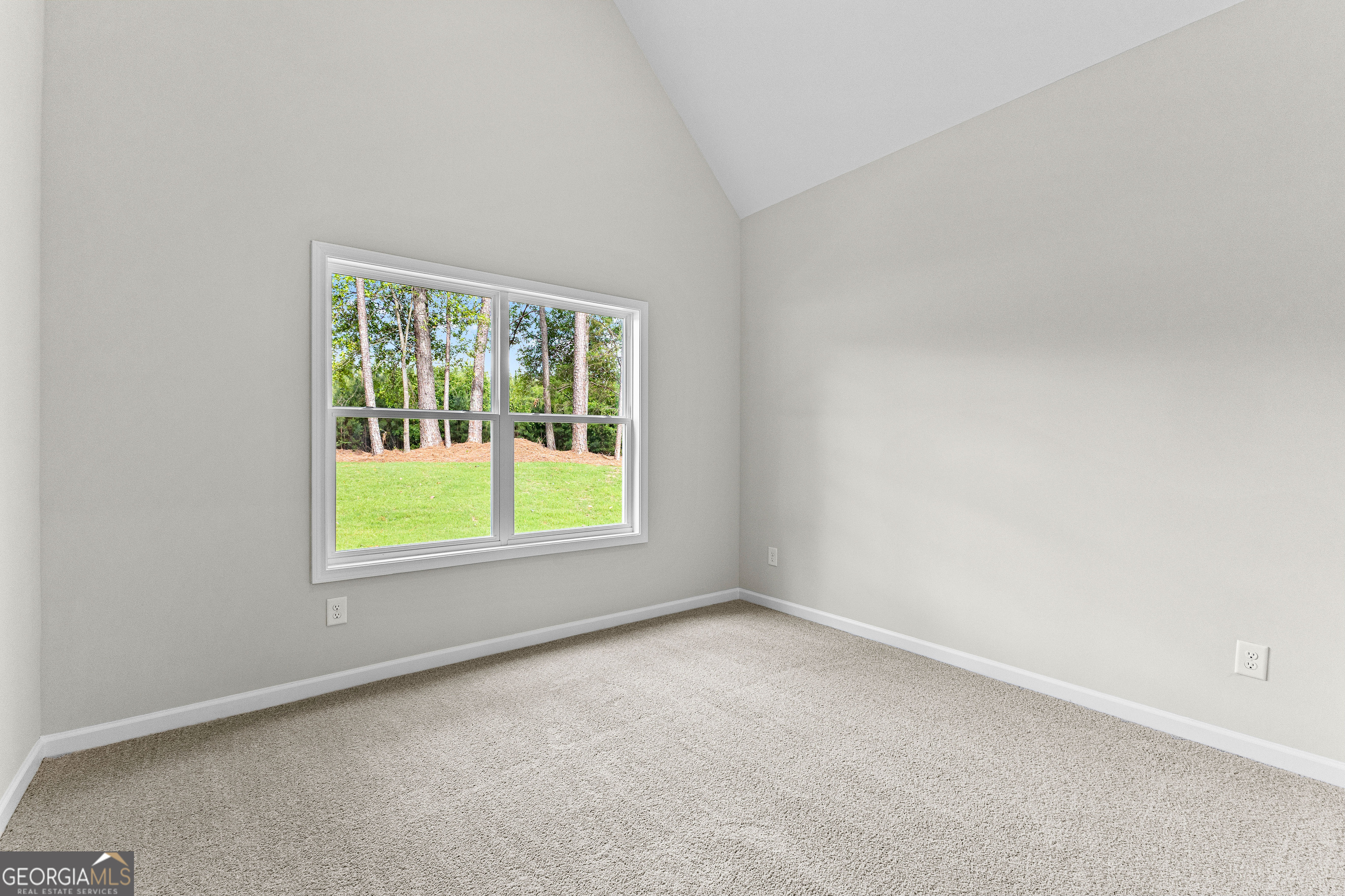 1242 Waymanville Road Thomaston, GA 30286 - Photo 43 of 52 an empty room with a window