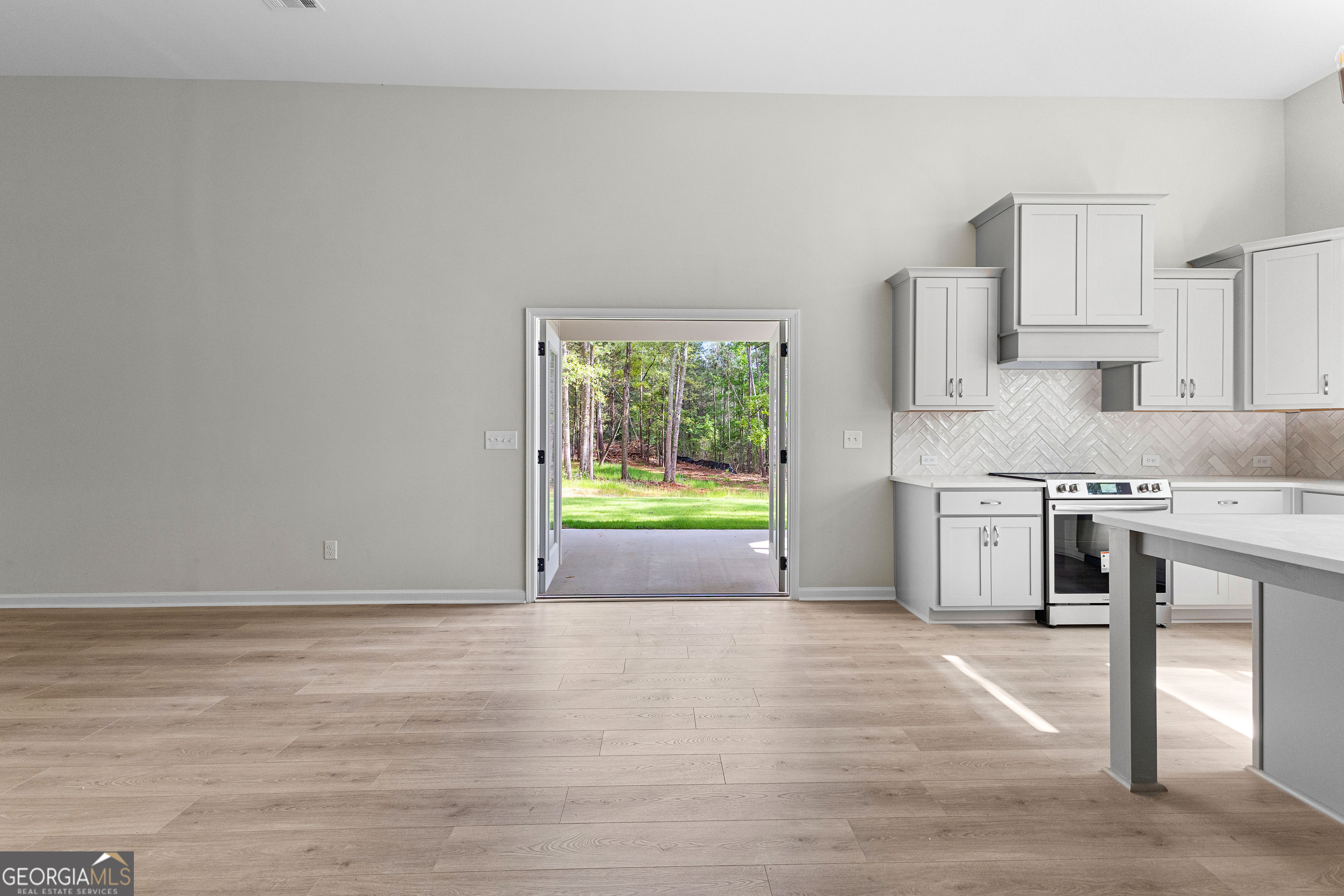 1242 Waymanville Road Thomaston, GA 30286 - Photo 45 of 52 a view of kitchen with granite countertop cabinets and outdoor space