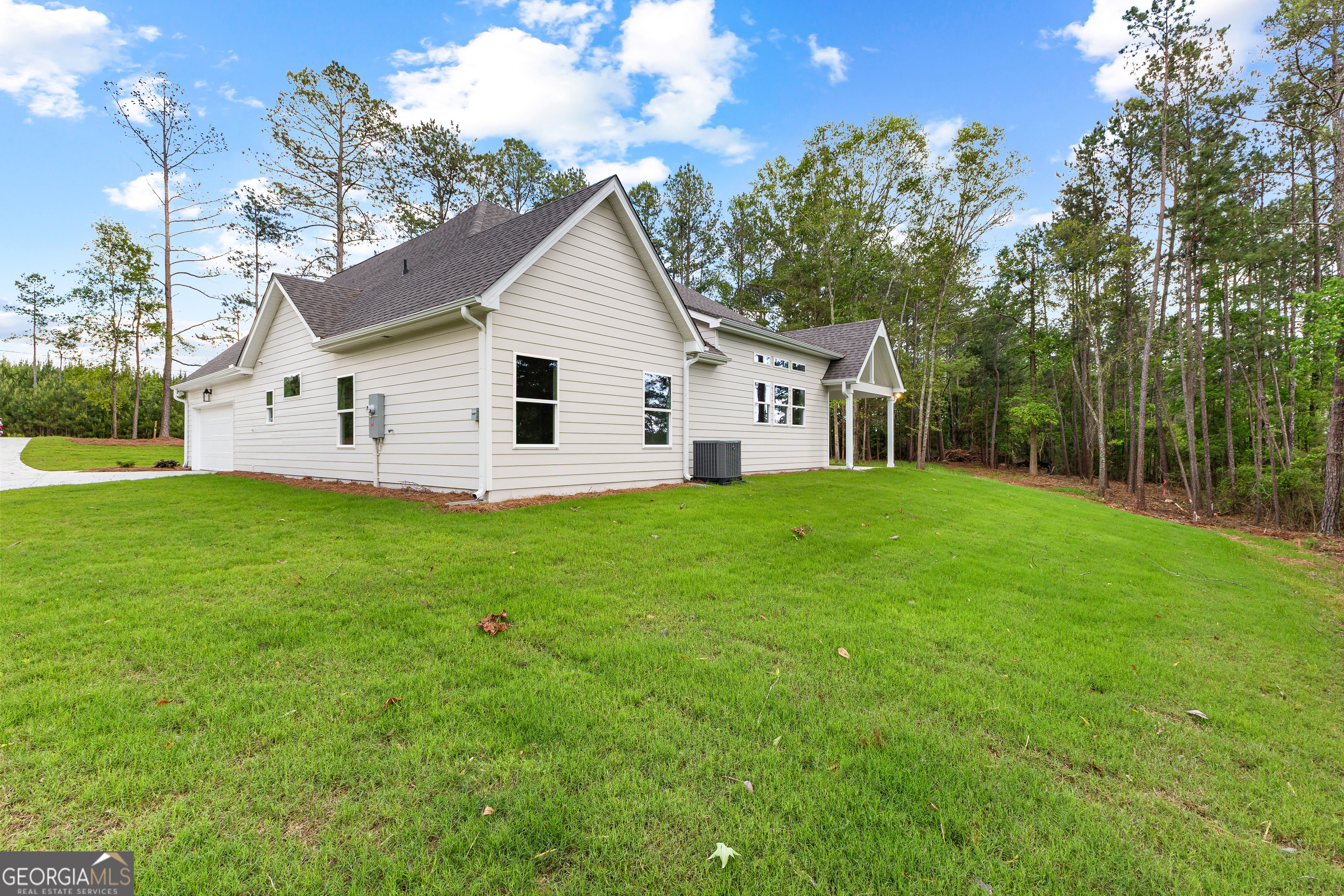 1242 Waymanville Road Thomaston, GA 30286 - Photo 51 of 52 a view of a house with a yard
