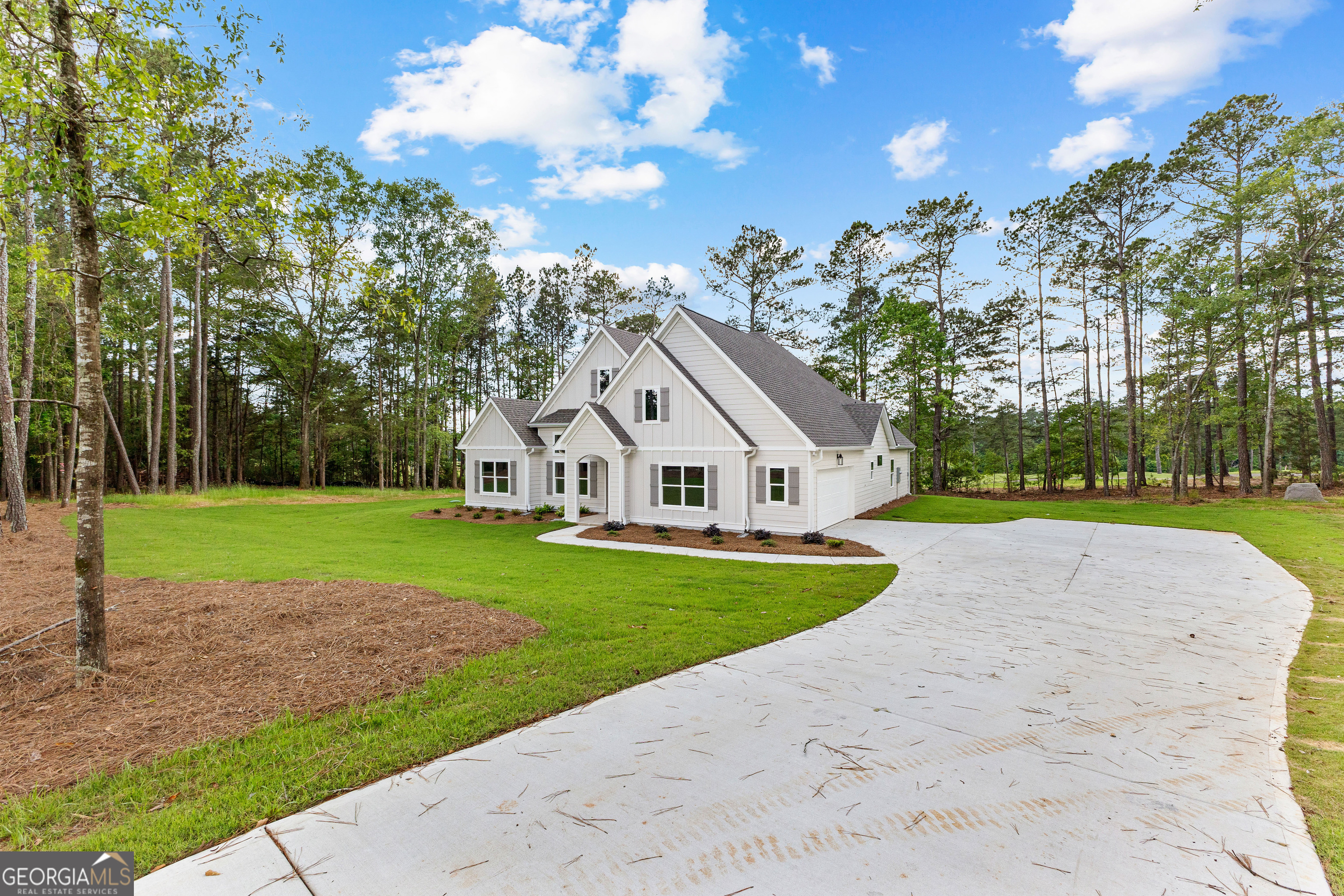 1242 Waymanville Road Thomaston, GA 30286 - Photo 6 of 52 a front view of a house with garden