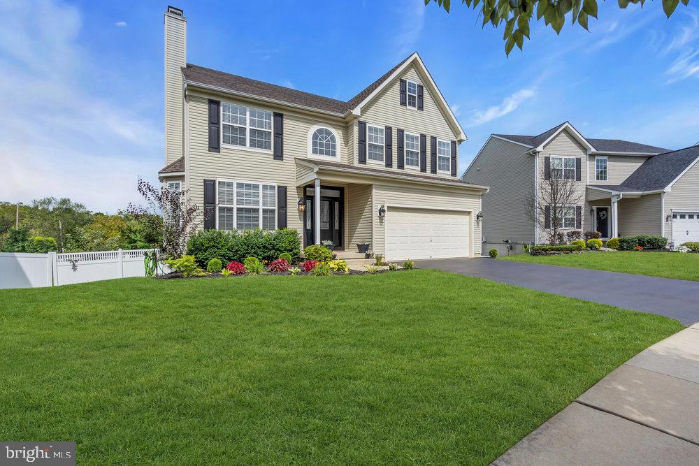 41 Buckeye Road Swedesboro, NJ 08085 - Photo 2 of 81 Charming home with lush green lawn.
