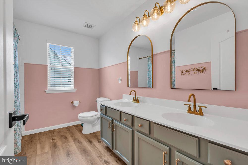 41 Buckeye Road Swedesboro, NJ 08085 - Photo 38 of 81 Chic dual-sink bathroom with elegant accents.