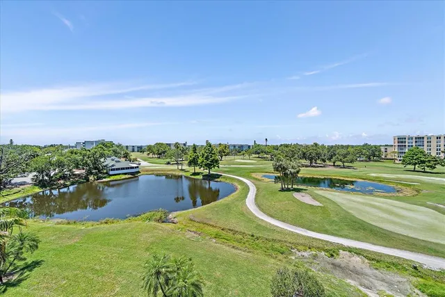 a view of a swimming pool with a lake view