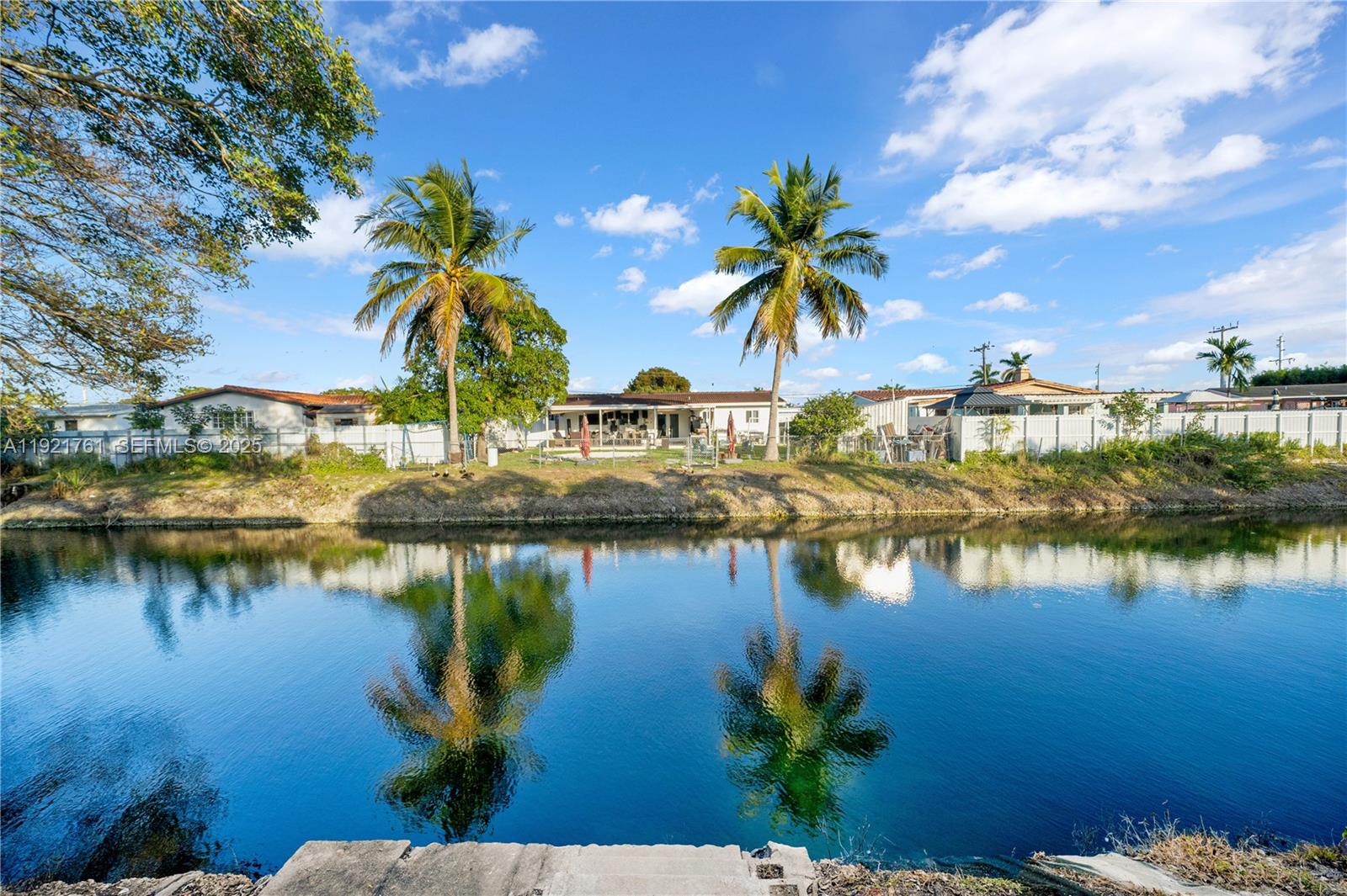 4701 Southwest 104th Court Miami, FL 33165 - Photo 10 of 16 a view of an ocean with palm trees