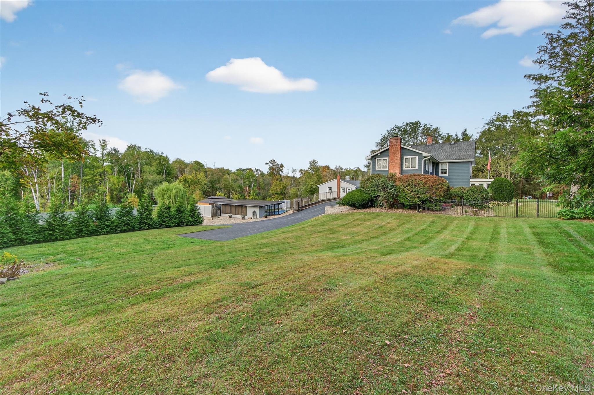 23 Creek Road Staatsburg, NY 12580 - Photo 22 of 39 a view of a big yard with potted plants and large tree