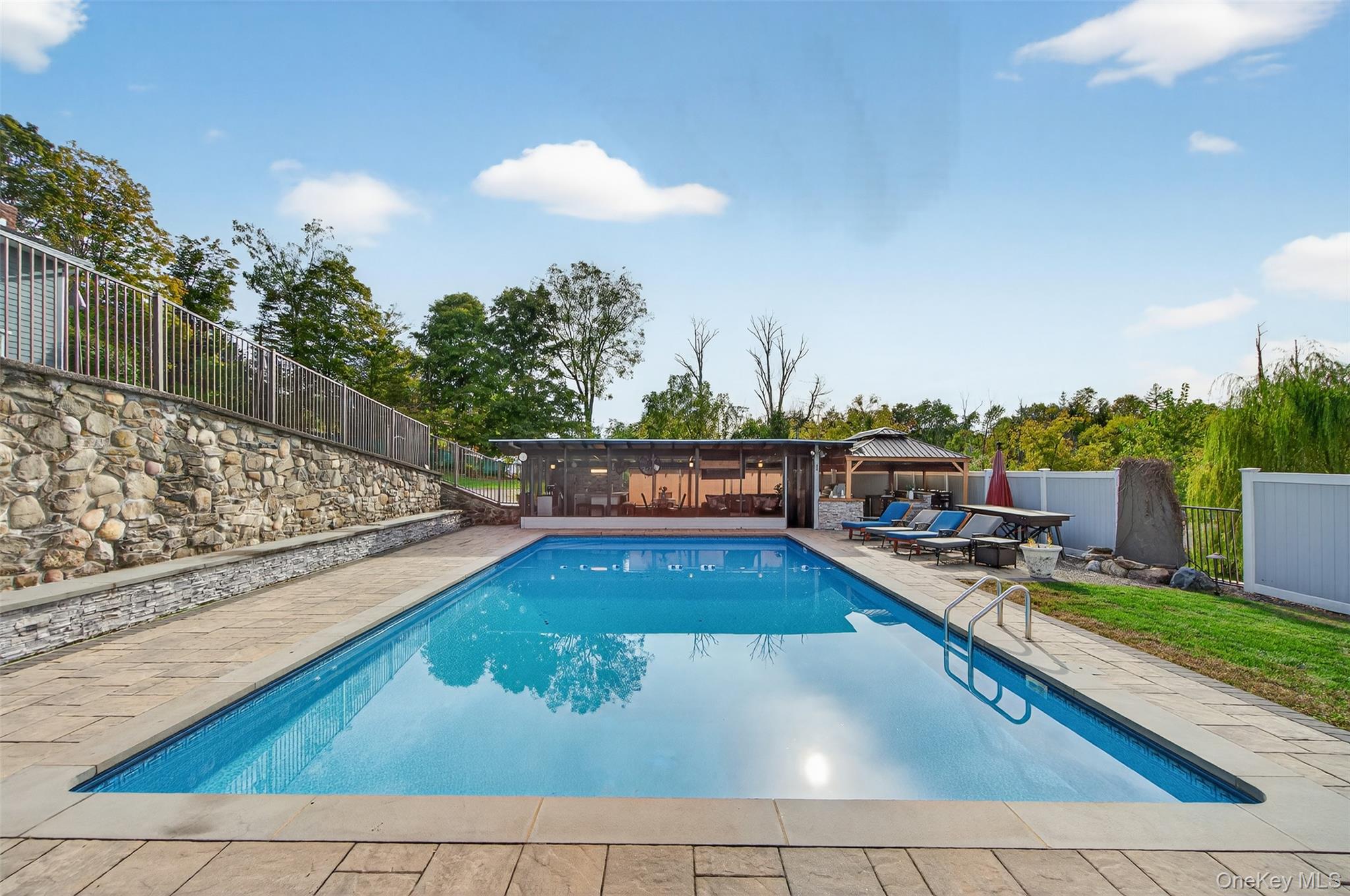 23 Creek Road Staatsburg, NY 12580 - Photo 32 of 39 a view of a swimming pool with seating space
