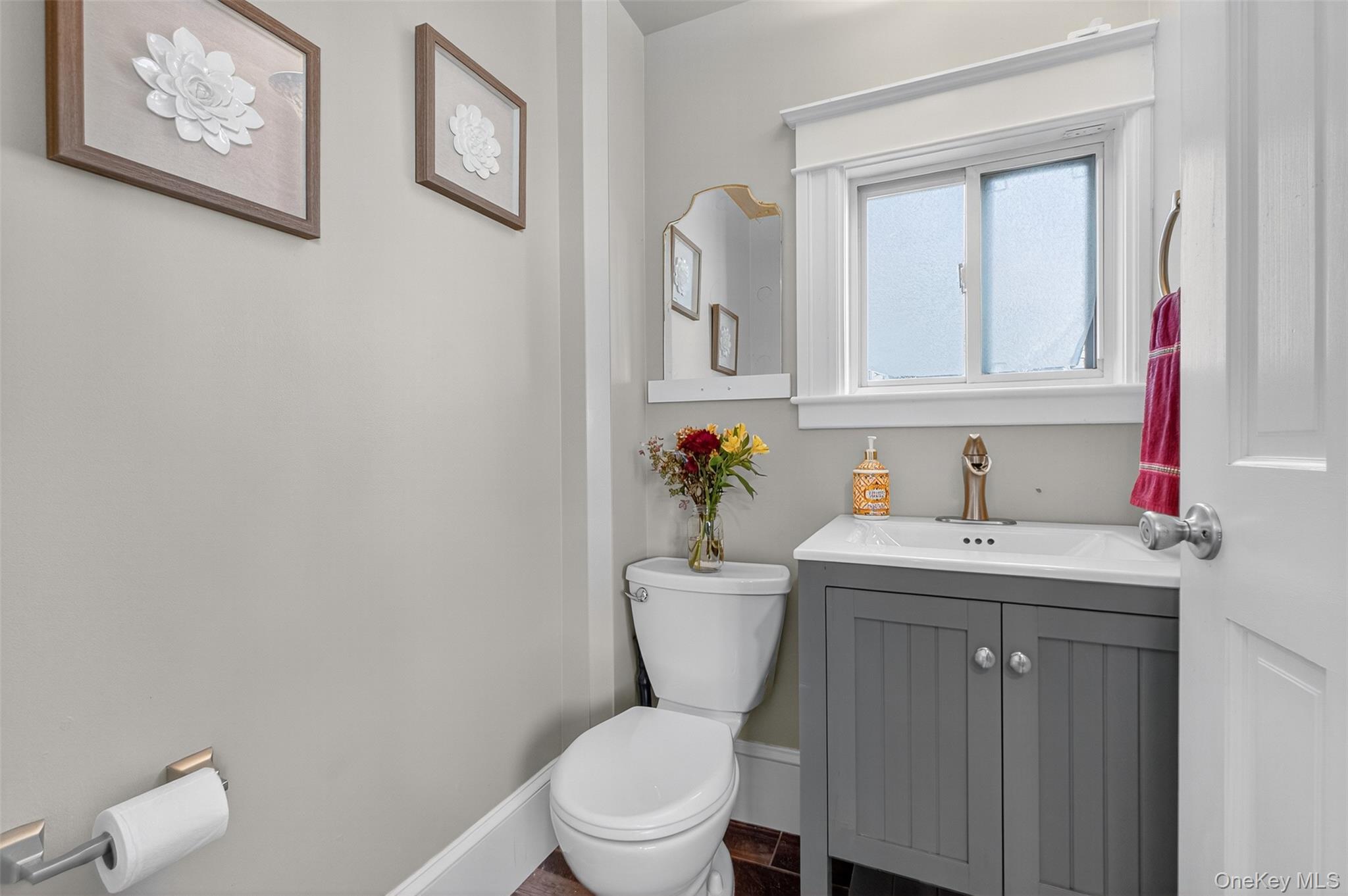 23 Creek Road Staatsburg, NY 12580 - Photo 8 of 39 a bathroom with a toilet sink and mirror
