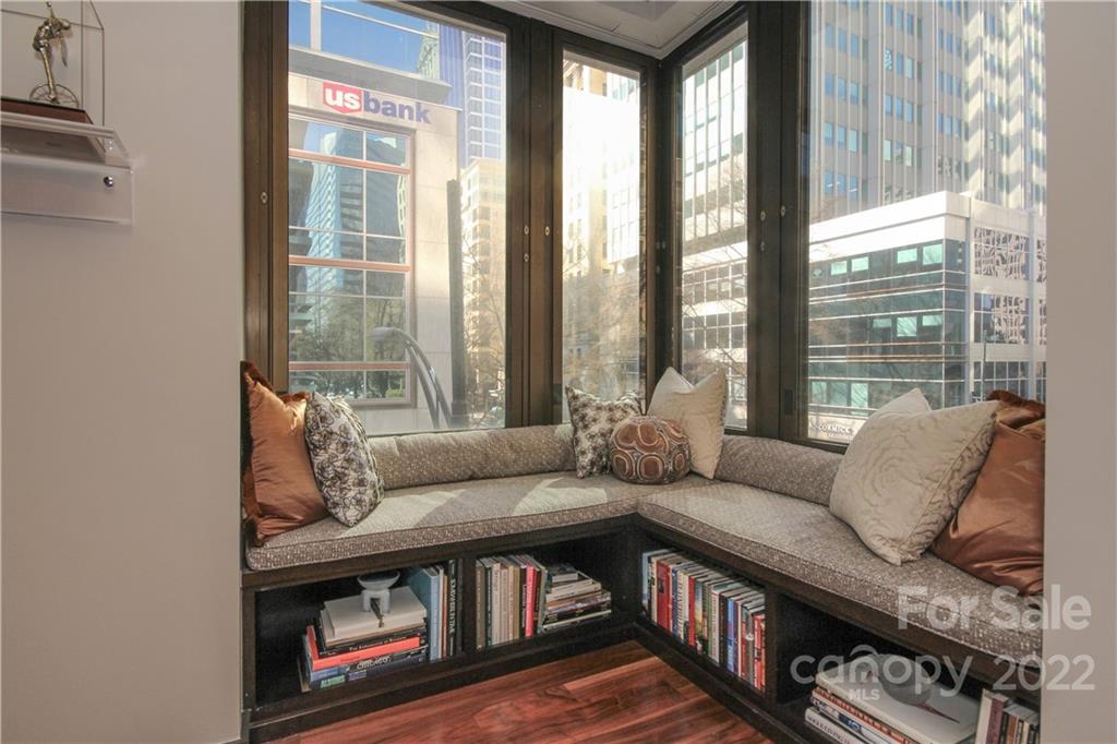 139 South Tryon Street Charlotte, NC 28202 - Photo 13 of 48 a living room with furniture and a floor to ceiling window