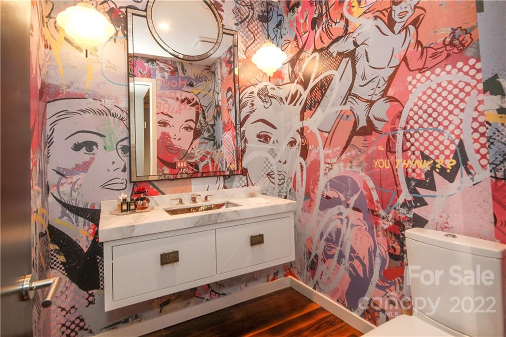 139 South Tryon Street Charlotte, NC 28202 - Photo 15 of 48 a utility room with a sink and wooden floor