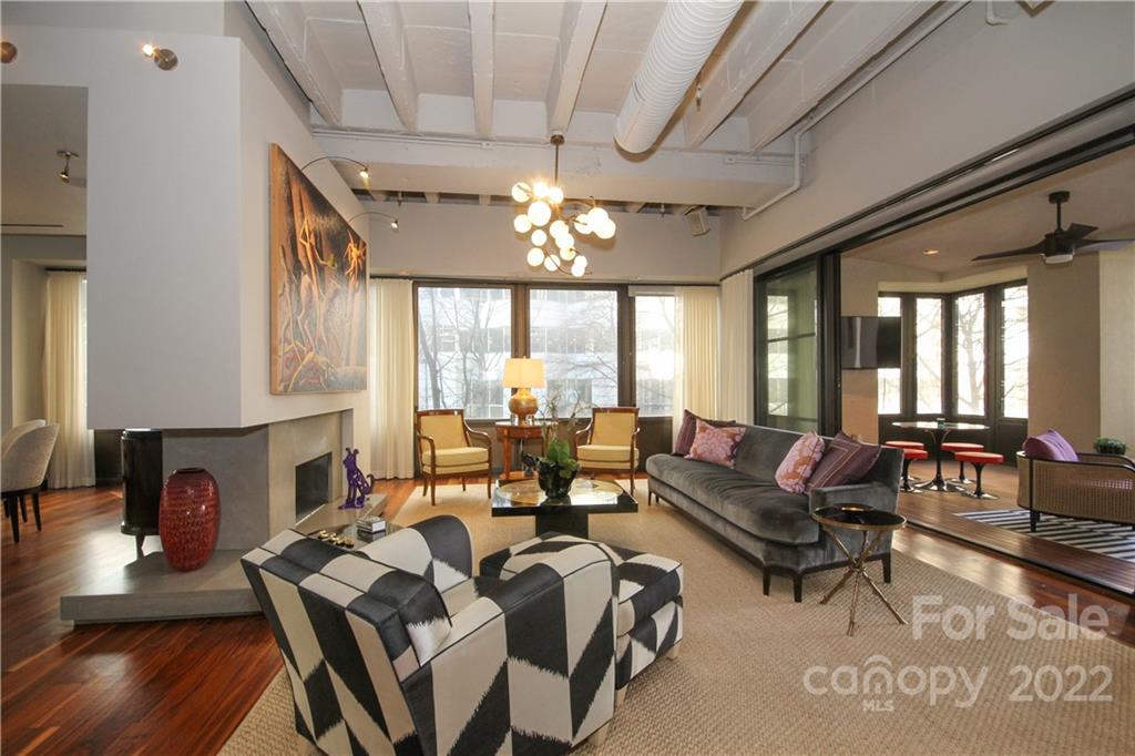 139 South Tryon Street Charlotte, NC 28202 - Photo 6 of 48 a living room with furniture and a large window