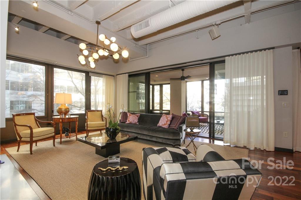139 South Tryon Street Charlotte, NC 28202 - Photo 7 of 48 a living room with furniture and a large window