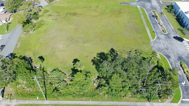 a view of a swimming pool with a garden