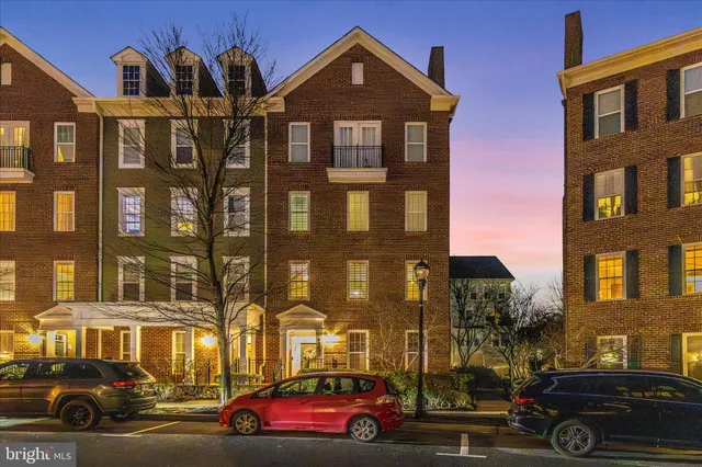 a view of a car parked in front of a building