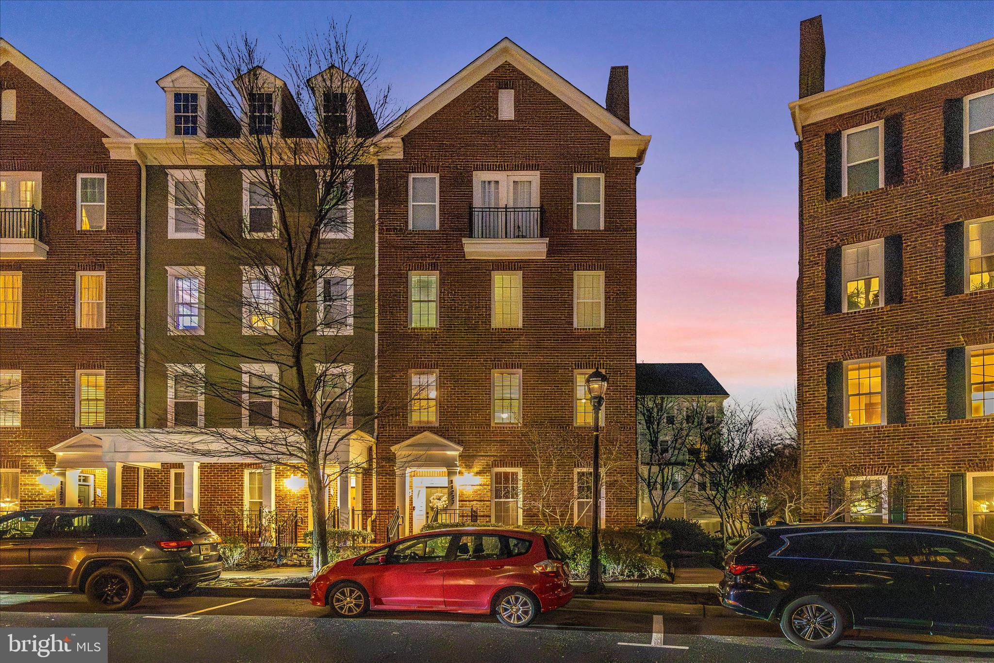 a view of a car parked in front of a building