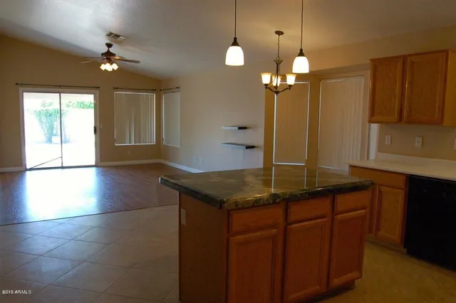 a utility room with a sink washer and dryer
