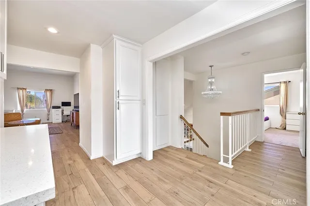 a spacious bedroom with a bed and walk in closet