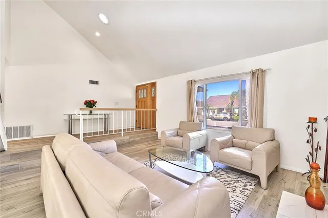 a living room with furniture and a table