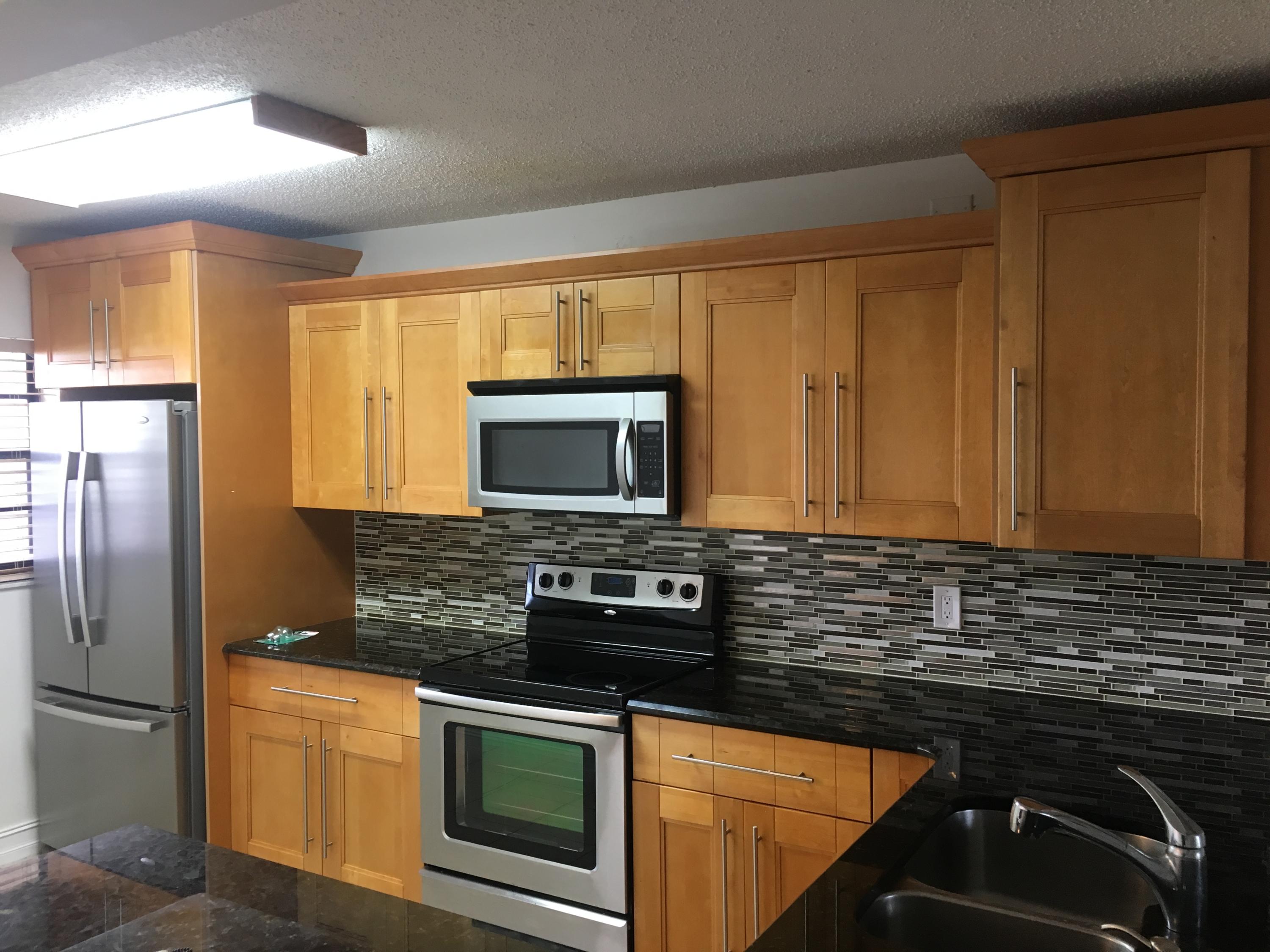 23288 Southwest 57th Avenue, Unit 102 Boca Raton, FL 33428 - Photo 1 of 7 Kitchen