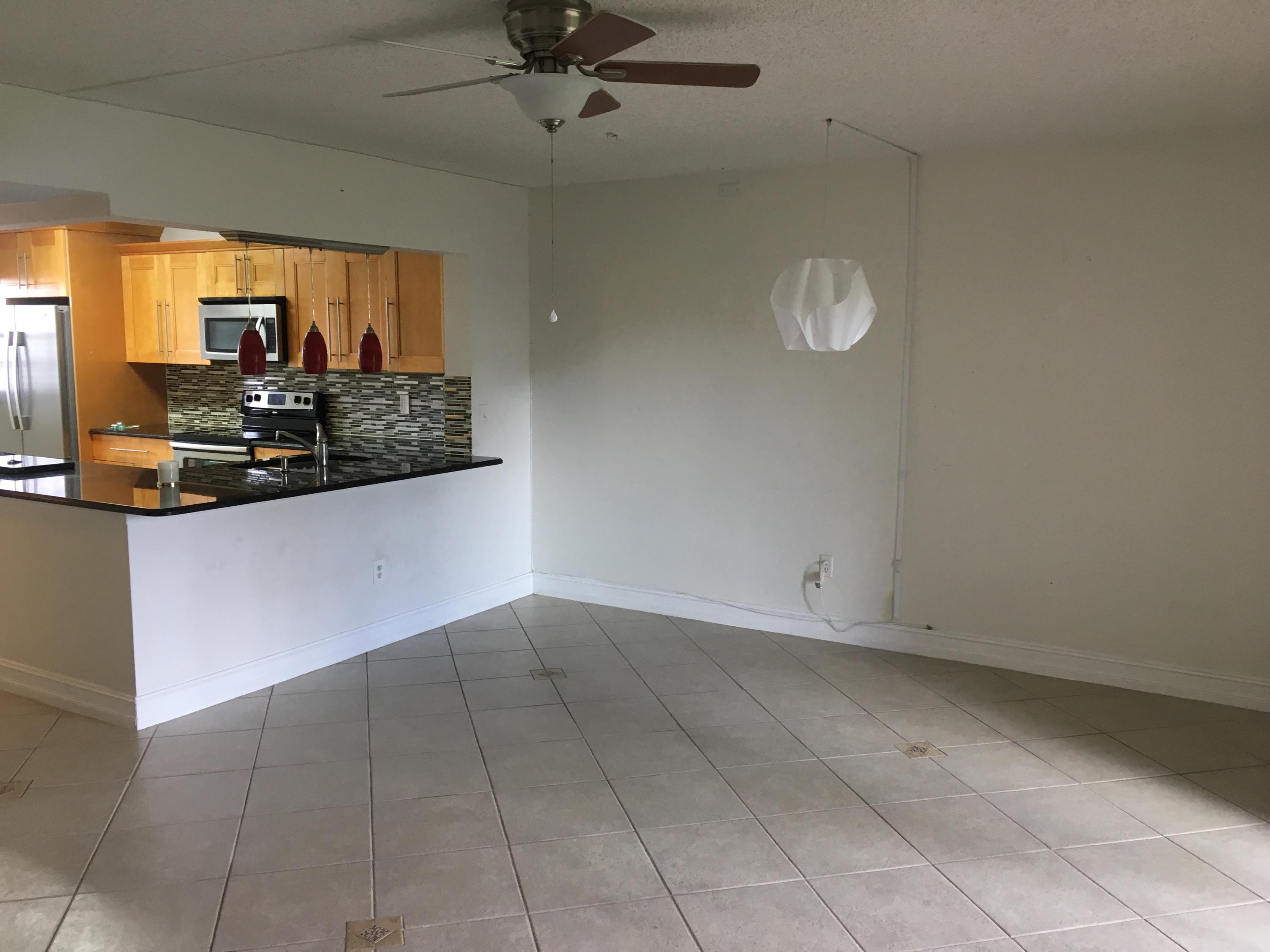 23288 Southwest 57th Avenue, Unit 102 Boca Raton, FL 33428 - Photo 2 of 7 Living Room