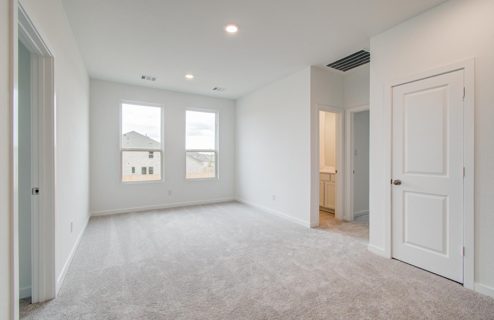 11122 Swamp Edge Lane Cypress, TX 77433 - Photo 28 of 43 an empty room with windows and closet