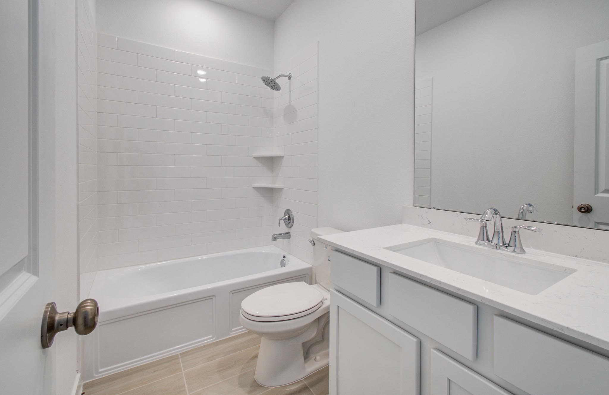 11122 Swamp Edge Lane Cypress, TX 77433 - Photo 35 of 43 a bathroom with a sink a toilet and a bathtub