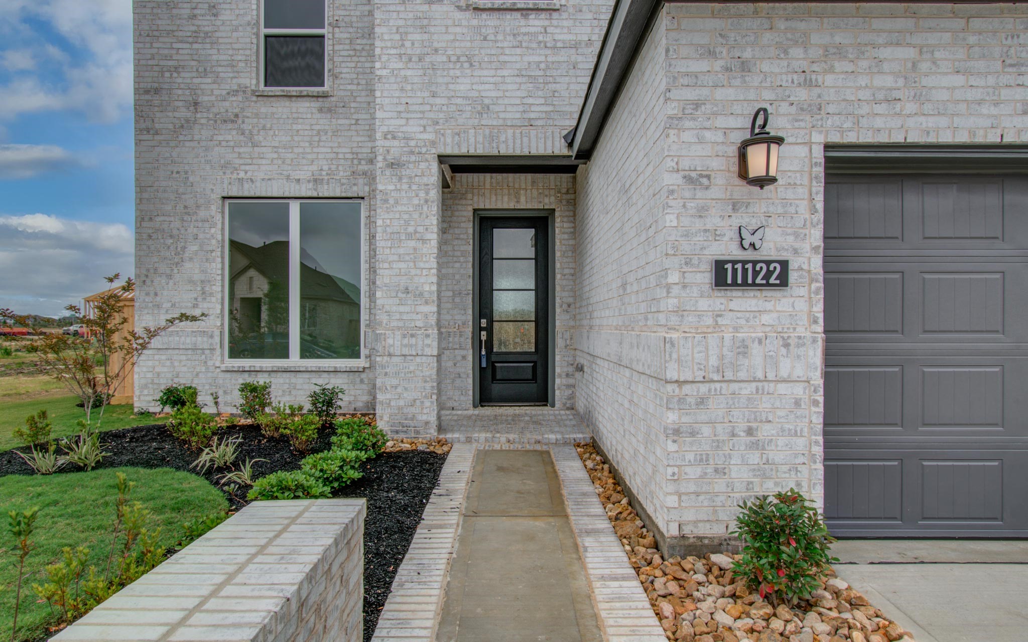 11122 Swamp Edge Lane Cypress, TX 77433 - Photo 4 of 43 a front view of a house with a yard