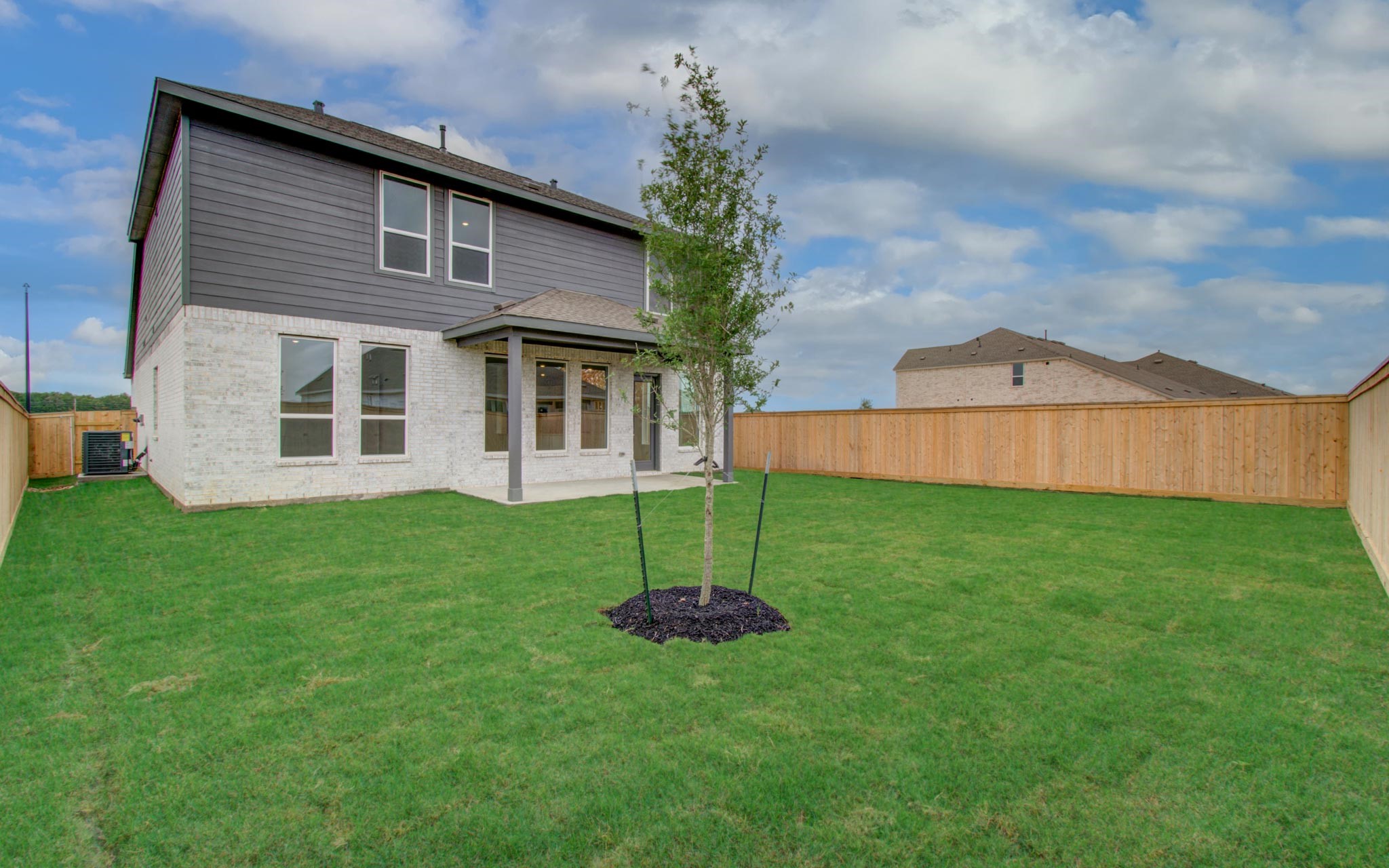 11122 Swamp Edge Lane Cypress, TX 77433 - Photo 41 of 43 a house view with a garden space