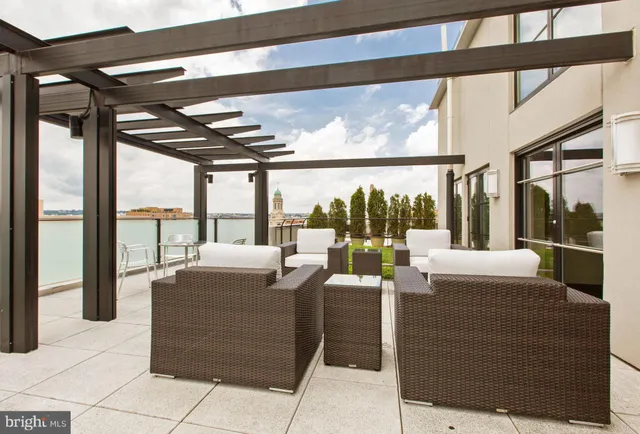 a living room with large windows