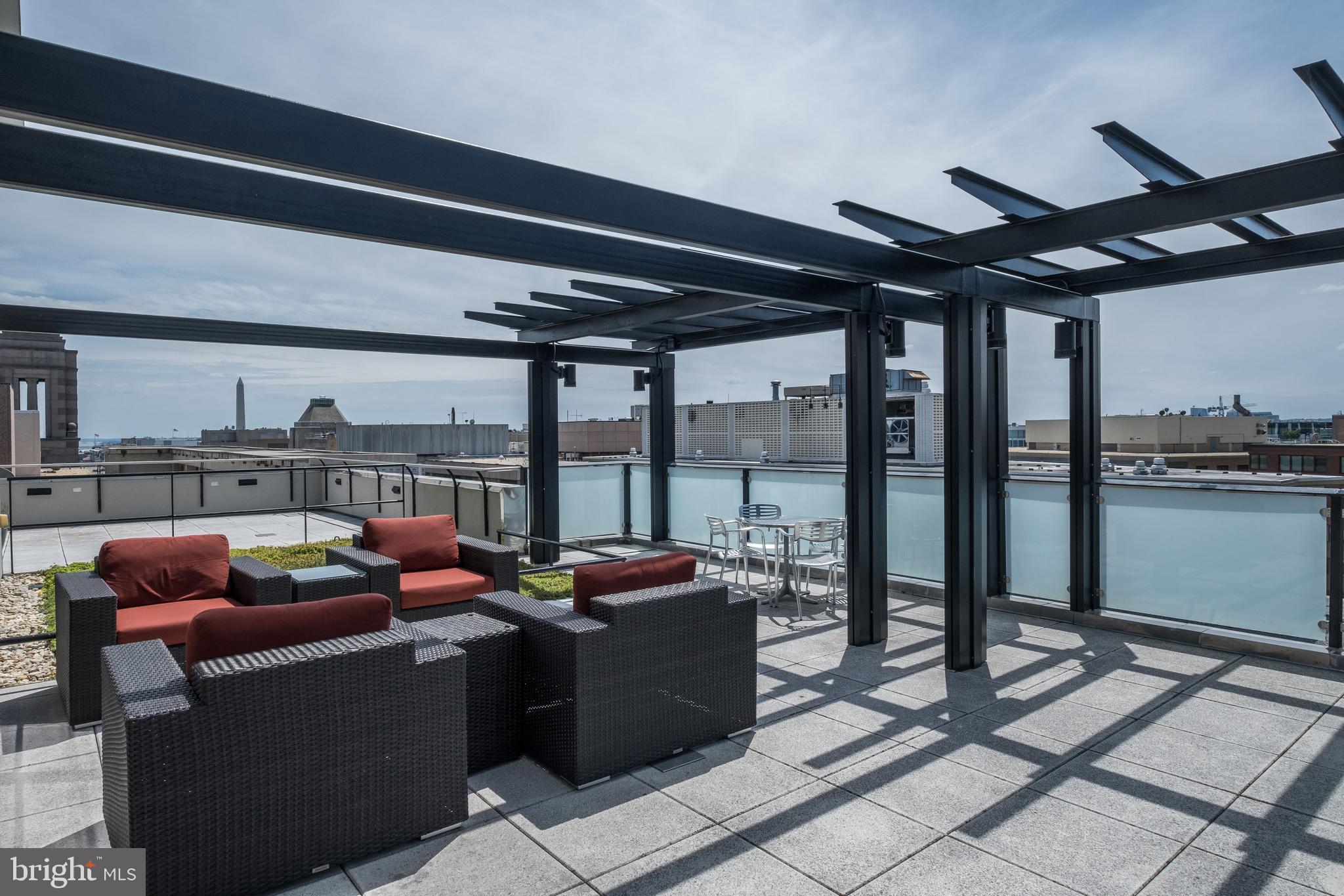 1133 14th Street Northwest, Unit 809 Washington, DC 20005 - Photo 21 of 27 a living room with furniture